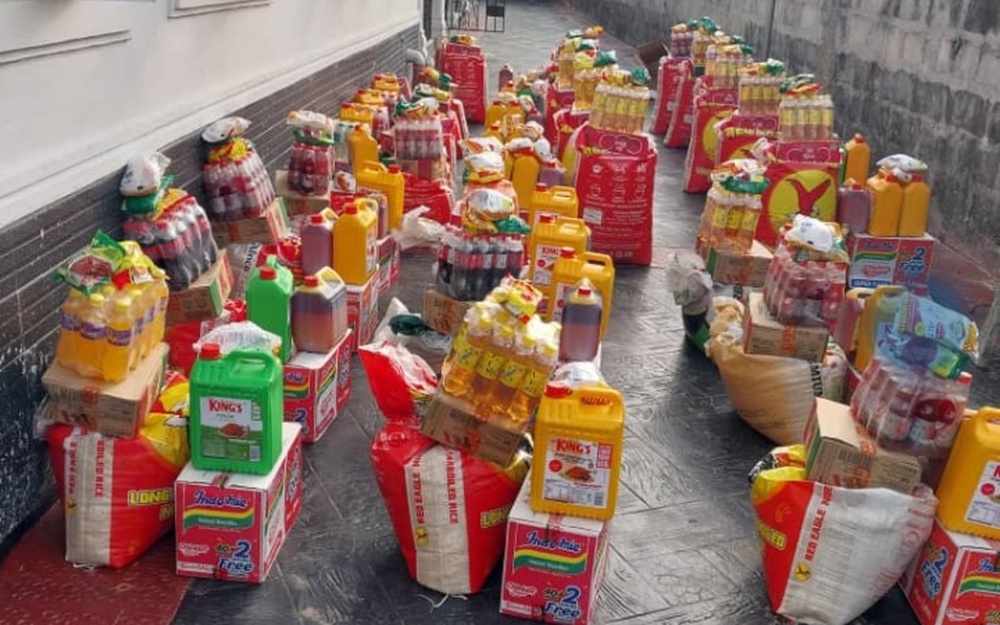 Rows of Lady B's Christmas food packages arranged for member collection